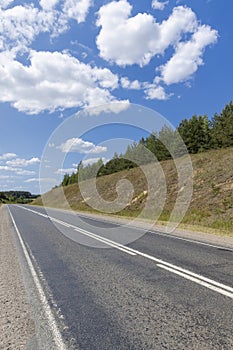 small hills through which the highway passes photo