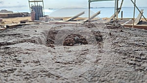Small hole dug on the seashore