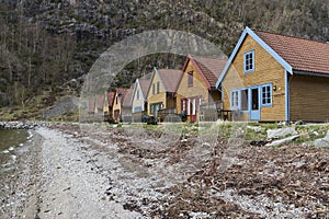 Small holiday homes at coastline in norway