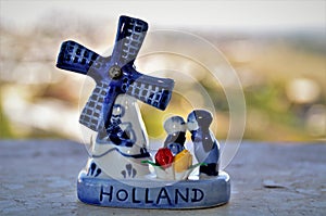 A romantic couple in a ceramic windmill from Holland photo