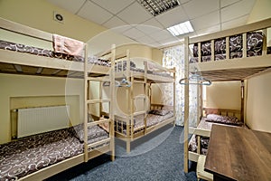 Small hostel room with bunk beds