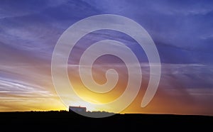 Small house in Alentejo region at sunset