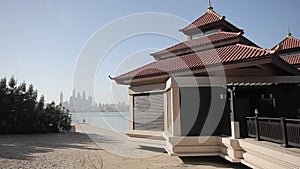 A small house in the Chinese style on the shore