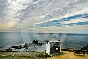 Small house on the edge of the cliff.