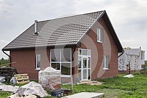 Small house is finished with decorative bricks