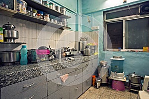 Small house interior shoing kitchen of middle class in Mumbai