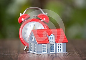 Small house model and alarm clock