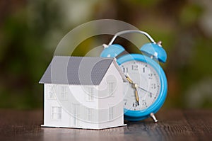 Small house model and alarm clock