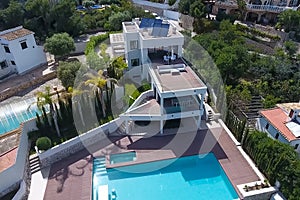 small house with a swimming pool on the shores of the Mediterran