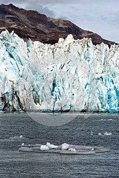 Ice Chunks Dwarfed by Mountains Aialik Glacier Alaska Kenia Fjords