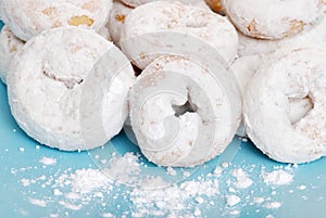 Small icing sugar covered donuts photo