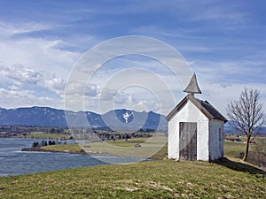 Small idyllic meadow chapel near Riegsee