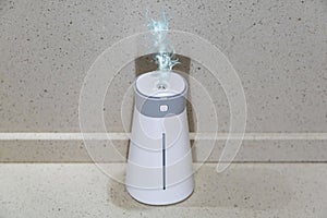 Small interior humidifier made of white plastic