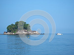 Small island with dive boat