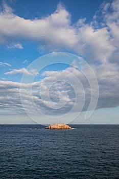 Small island with the independentist catalan flag