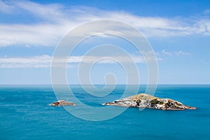 Small island and islet off the coast of the Arraial do Cabo peninsula in Brazil