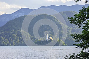 The small island of Lake Bled, Slovenia at sunset