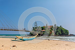 A small island near the beach by the ocean