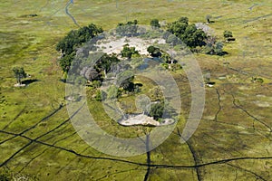 Small island in the Okavango Delta seen from heli