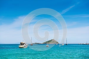 Small island and sailboats