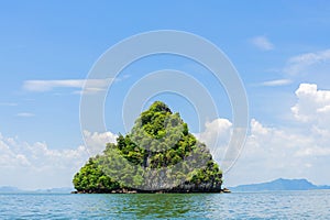 Small island on sea and White cloud on blue sky