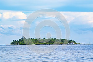 Small island in tropical sea Maldives atoll