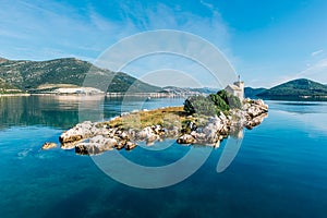 small island with a very old lighthouse located in southern Croatia, Dalmatia