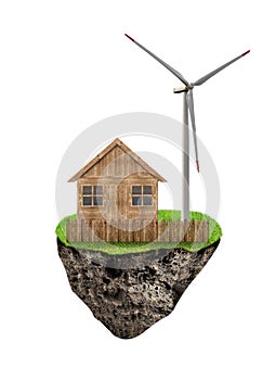 Small island with wooden house and wind turbine