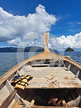 Small Islands view from a long wooden boat in the Tarutao National Park, Koh Lipe, Thailand