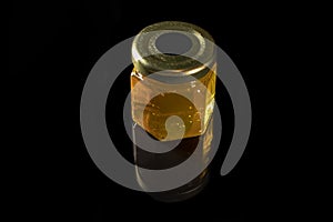 A small jar of honey