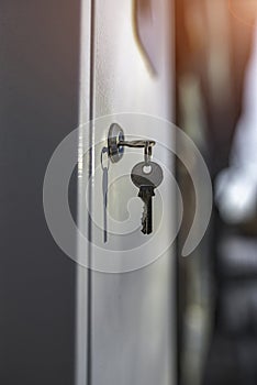 A small key stuck in the door lock