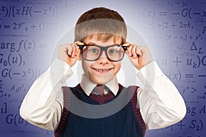 Small kid prodigy on the formulas background