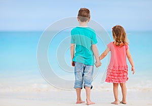 Small kids at tropical beach