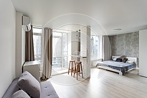 Small kitchenette in a studio, interior lighting.