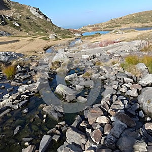 a small lake in the mountain