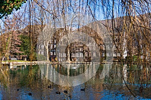 Small lake, in a park in BagnÃÂ¨re de Luchon, Haute Garonne, Occitanie, France photo