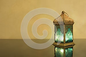 Small Lantern on a dark glass