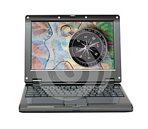 Small laptop with compass and map