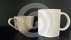 Small, large, old-fashioned ceramic mugs until two ivory patterns are broken,