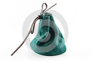 Small leather green pouch on isolated background. photo