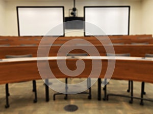 Small lecture hall with pitched floor. Abstract blur