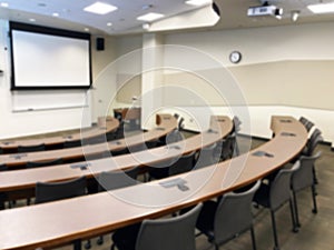 Small lecture hall with pitched floor. Abstract blur