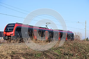 Small light rail R-Net commuter at Waddinxveen between Gouda and alphen aan den Rijn