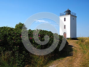 Small lighthouse on the coast Baagoe BÃ¥gÃ¸ Island Funen Denmark
