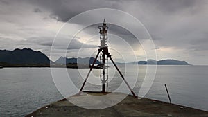 Small lighthouse in Laukvik at sunset.