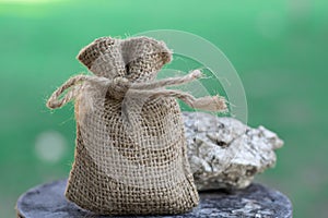 Small linen bag on blur background