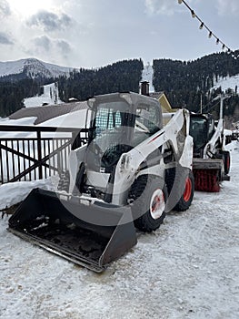 Small loader for snow removal