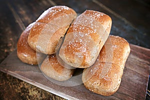 Small Loaves of Sea Salted and Buttered Fresh Baked Whole Wheat Bread