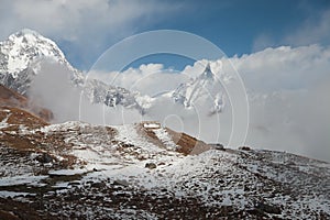 The small lodge mislaid among mountain tops. Nepal.