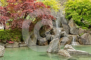 Small manmade waterfalls at the Japanese garden